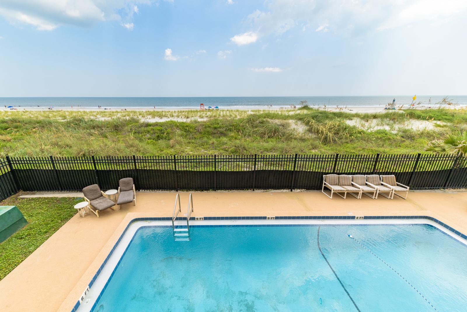 The pool and dunes, seen from a balcony