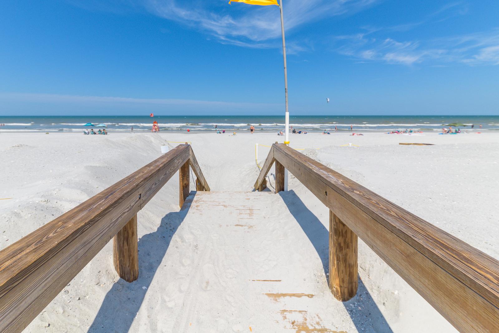 Boardwalk steps onto the beach