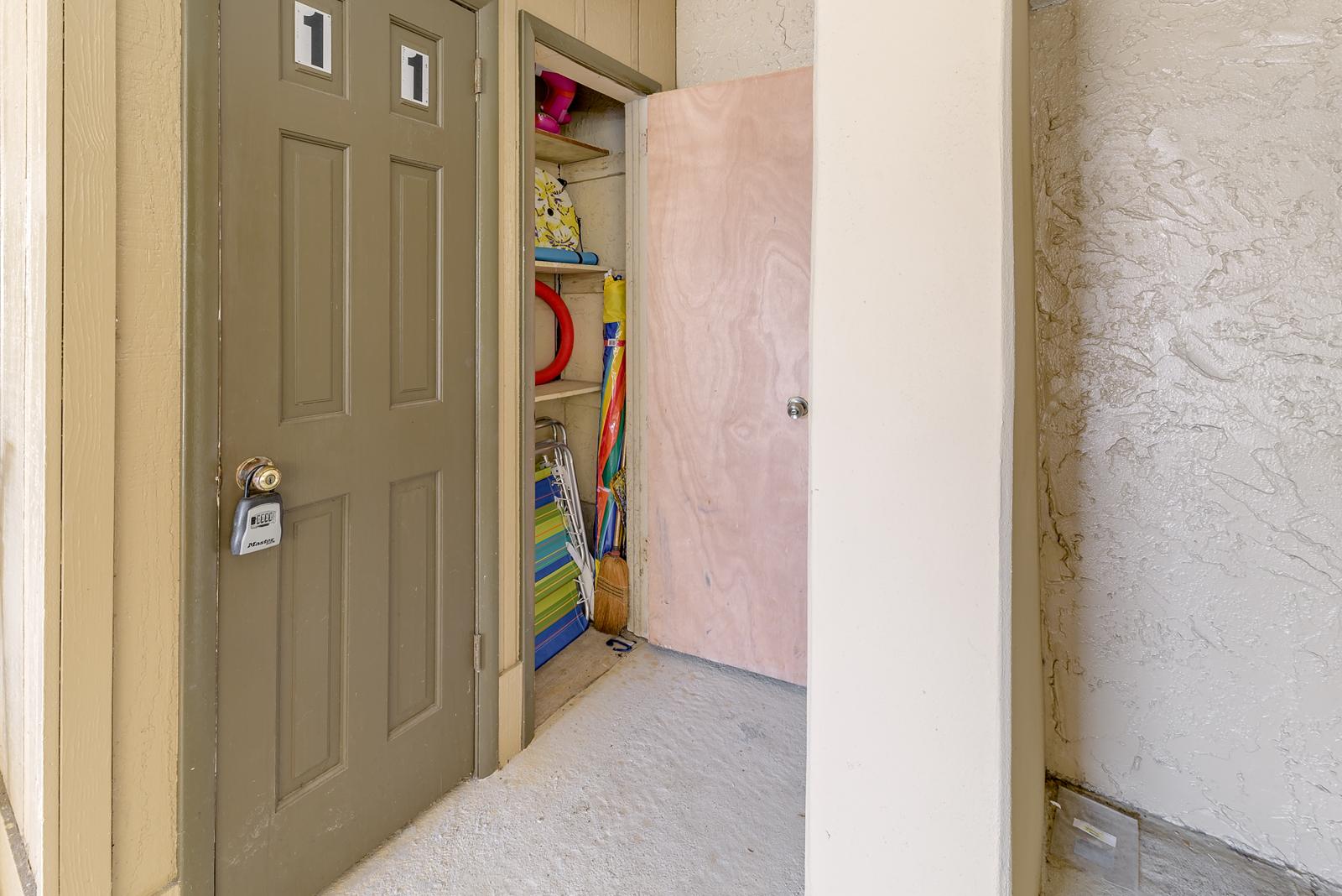 Beach chairs and toys in the storage locker